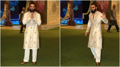 Ranveer Singh rocked an Anamika Khanna kurta pajama, featuring a beige kurta adorned with intricate golden embroidery. He paired it with white pants, brown shoes, and brown-tinted sunglasses, perfectly completing his look (HT photo/VarinderChawla) Ranveer Singh rocked an Anamika Khanna kurta pajama, featuring a beige kurta adorned with intricate golden embroidery. He paired it with white pants, brown shoes, and brown-tinted sunglasses, perfectly completing his look (HT photo/VarinderChawla)