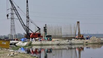 Illegal constrictions at Yamuna river bank (Representative Photo) Illegal constrictions at Yamuna river bank (Representative Photo)