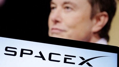 SpaceX logo and Elon Musk photo are seen in this illustration. (Reuters)