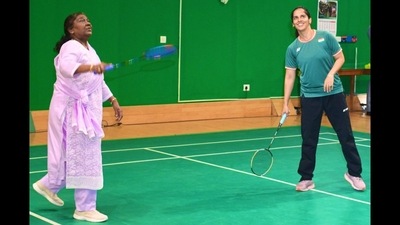 President of India, Droupadi Murmu, playing a game of badminton with Saina Nehwal. (X/@NSaina) President of India, Droupadi Murmu, playing a game of badminton with Saina Nehwal. (X/@NSaina)