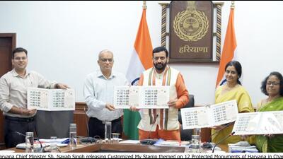 The CM at the event, releasing stamp sheets on heritage sites and monuments. (HT) The CM at the event, releasing stamp sheets on heritage sites and monuments. (HT)