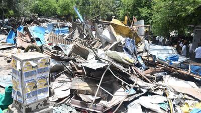 The civic body cleared some illegal structures on Bund Garden Road on Thursday. (HT PHOTO)