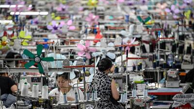 This photo taken on June 11, 2024 shows workers producing garments at a textile factory that supplies clothes to fast fashion e-commerce company Shein in Guangzhou in southern China's Guangdong province. (Photo by Jade GAO / AFP) (AFP) This photo taken on June 11, 2024 shows workers producing garments at a textile factory that supplies clothes to fast fashion e-commerce company Shein in Guangzhou in southern China's Guangdong province. (Photo by Jade GAO / AFP) (AFP)