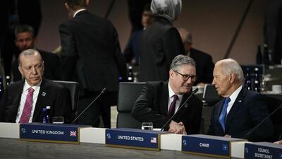 US President Joe Biden (right) speaks with UK Prime Minister Keir Starmer during a Working Session of the Nato Summit at the Walter E Washington Convention Center in Washington, DC, on Thursday. (AFP)