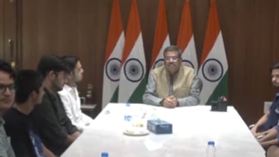 Union Education Minister Dharmendra Pradhan on Thursday met a group of NEET-UG aspirants at his residence (Twitter/video screengrab)