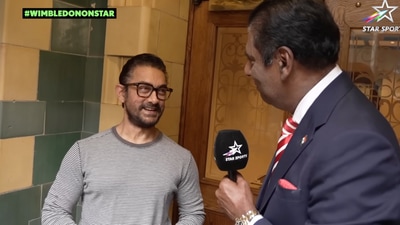 Aamir Khan in a conversation with Vijay Amritraj. Aamir Khan in a conversation with Vijay Amritraj.