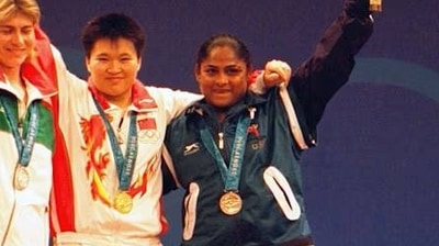 Karnam Malleswari made history at Sydney 2000 by winning a bronze in weightlifting and becoming the first Indian woman to win an Olympic medal. Malleswari competed in the women's 69kg category and managed to lift a best weight of 110.0kg in snatch and 130.0kg in clean and jerk. She thus finished with a total of 240.0kg, putting herself well clear of fourth spot. (Getty Images ) Karnam Malleswari made history at Sydney 2000 by winning a bronze in weightlifting and becoming the first Indian woman to win an Olympic medal. Malleswari competed in the women's 69kg category and managed to lift a best weight of 110.0kg in snatch and 130.0kg in clean and jerk. She thus finished with a total of 240.0kg, putting herself well clear of fourth spot. (Getty Images )
