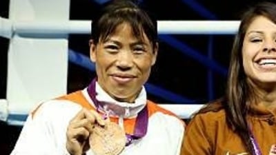 Mary Kom won India's second boxing medal at the Olympics by winning bronze at London 2012. She was the first Indian woman to win a Games boxing medal and her success made it the first time that two women, the other being Saina Nehwal, from the country had medalled at the same Olympics. (Getty Images) Mary Kom won India's second boxing medal at the Olympics by winning bronze at London 2012. She was the first Indian woman to win a Games boxing medal and her success made it the first time that two women, the other being Saina Nehwal, from the country had medalled at the same Olympics. (Getty Images)