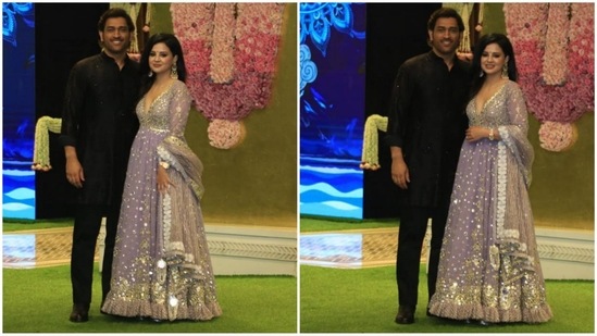 Power couple MS Dhoni and Sakshi Dhoni made a stunning appearance in glamorous outfits. Sakshi dazzled in a lavender embellished anarkali suit, while Dhoni kept it classic and minimal in a black kurta pajama.(HT photo/VarinderChawla)