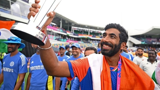  India's Jasprit Bumrah poses for a picture with the trophy after Team India wins the ICC Mens T20 World Cup 2024 final(BCCI-X)