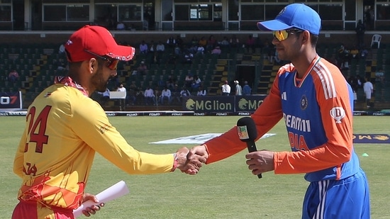 Latest news on July 11, 2024: India's Shubman Gill (R) shakes hands with Zimbabwe's Sikandar Raza (L) after winning the toss and electing to bat 