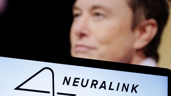 Neuralink logo and Elon Musk photo are seen in this illustration. Neuralink hopes to have its technology in several more patients by the end of this year, Elon Musk said.(Reuters)