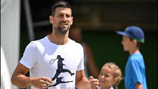 Serbia’s Novak Djokovic takes part in a training session in Wimbledon. (AFP)