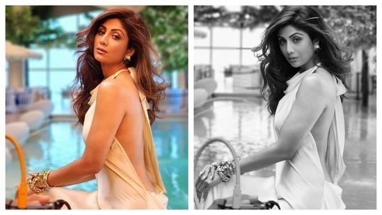 Shilpa Shetty turns up the heat with her sensual glam in a halter neck, backless satin dress. Wearing chunky golden bracelets and studs, along with wavy hair, she radiates sizzling charisma.(Instagram/@theshilpashetty )