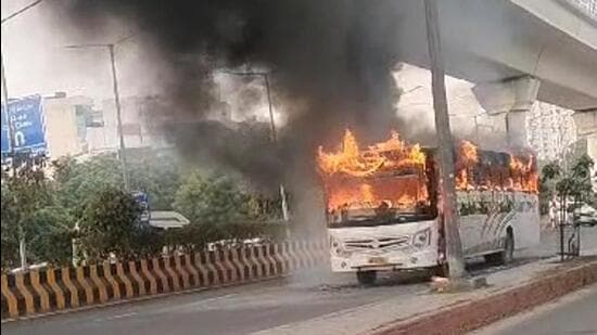 While returning along with the conductor from the welder’s shop, the fire erupted inside the rear part of the bus and the driver pulled up near the City Centre Metro station. (HT Photo)