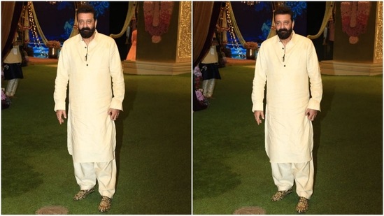 Sanju baba, aka Sanjay Dutt, rocked a dapper white kurta pajama look, complemented by a quirky pair of shoes and his signature beard.(HT photo/VarinderChawla)