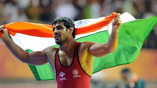 Sushil Kumar added to the medal haul in Beijing by winning bronze in men's 66kg freestyle wrestling. Sushil would then go on to become the first Indian to medal at consecutive Olympics, winning silver in men's 66kg freestyle at London 2012. (AFP)