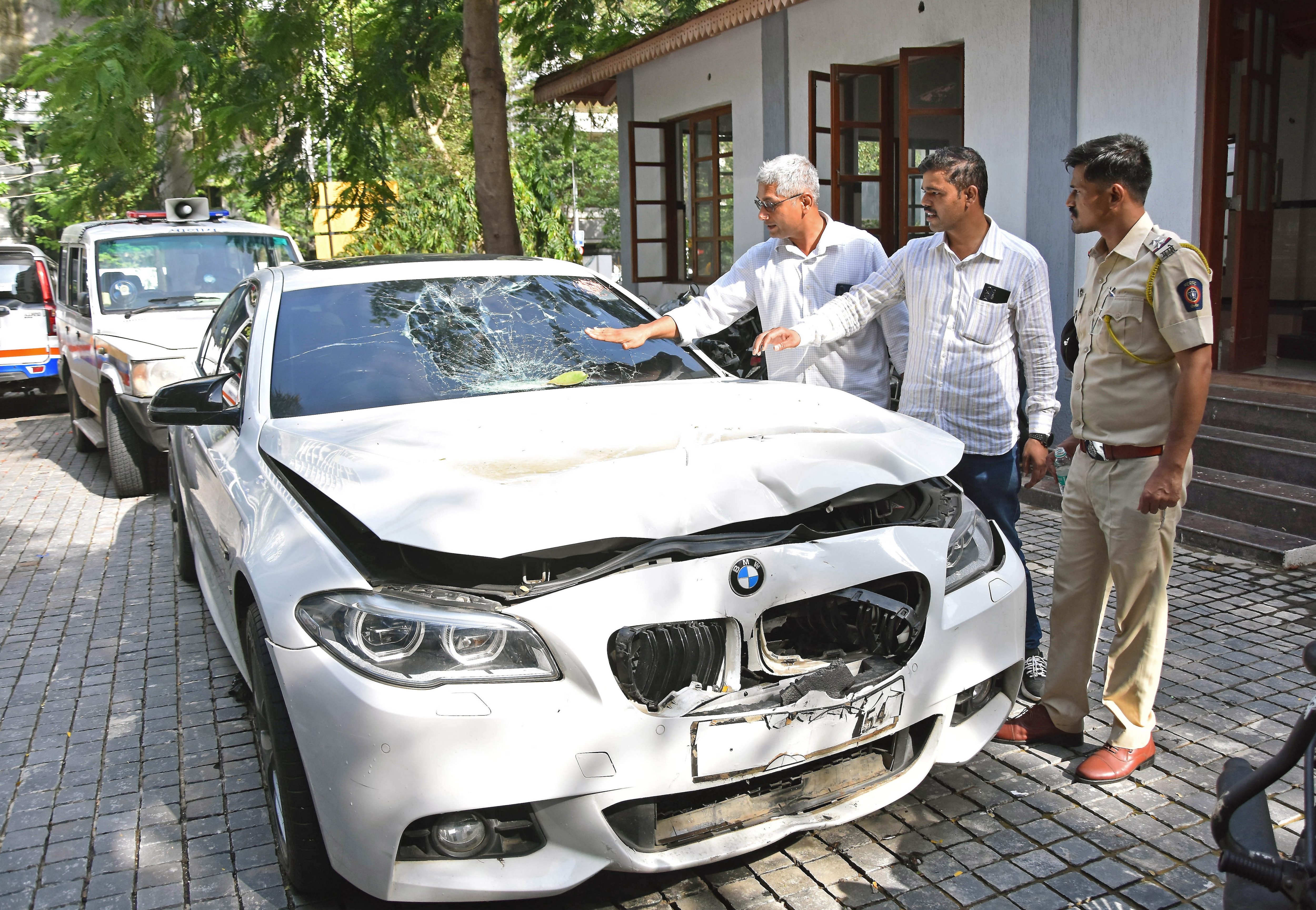 Police inspect the BMW vehicle of Mihir Shah, the main accused in the Worli hit-and-run case, at Worli Police Station, in Mumbai on Wednesday. (ANI) Police inspect the BMW vehicle of Mihir Shah, the main accused in the Worli hit-and-run case, at Worli Police Station, in Mumbai on Wednesday. (ANI)