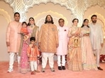 Anant Ambani and the rest of the Ambani family posed for the media at the wedding venue. Anant Ambani and the rest of the Ambani family posed for the media at the wedding venue.