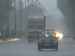 Visuals from P D'Mello Road shows heavy rainfall, with vehicles moving through the rain. Visuals from P D'Mello Road shows heavy rainfall, with vehicles moving through the rain.