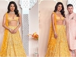 Priyanka looked gorgeous in a yellow lehenga while Nick Jonas gave us major goals in a pastel pink sherwani. Priyanka looked gorgeous in a yellow lehenga while Nick Jonas gave us major goals in a pastel pink sherwani.