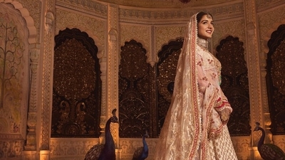 Radhika Merchant looks resplendent in an Abu Jani Sandeep Khosla bridal ensemble. Radhika Merchant looks resplendent in an Abu Jani Sandeep Khosla bridal ensemble.