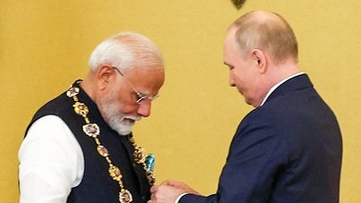 Moscow, Jul 10 (ANI): Prime Minister Narendra Modi receives the Order of St Andrew the Apostle the First-Called, Russia's highest civilian honour, by Russian President Vladimir Putin, at St Catherine's Hall, in Moscow on Tuesday. (ANI Photo) Moscow, Jul 10 (ANI): Prime Minister Narendra Modi receives the Order of St Andrew the Apostle the First-Called, Russia's highest civilian honour, by Russian President Vladimir Putin, at St Catherine's Hall, in Moscow on Tuesday. (ANI Photo)