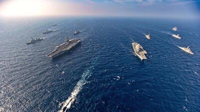 Aircraft carriers and warships from India, US, Japan and Australia during a joint exercise in the Northern Arabian Sea. (AP File Photo) Aircraft carriers and warships from India, US, Japan and Australia during a joint exercise in the Northern Arabian Sea. (AP File Photo)
