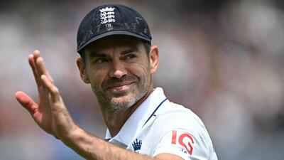 England's James Anderson waves to the crowd during a presentation ceremony after the conclusion of play on the third day of the first Test against West Indies at Lord's, in London on Friday. (AFP) England's James Anderson waves to the crowd during a presentation ceremony after the conclusion of play on the third day of the first Test against West Indies at Lord's, in London on Friday. (AFP)