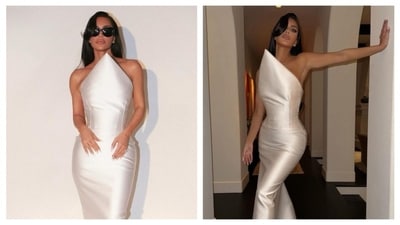 Kim Kardashian wore a white satin dress from Balenciaga Couture at the Oscars 2024 Vanity Fair party. The sculpted finish of the dress, with its protruding neckline, adds a contemporary twist to the elegant silk gown. With cascading curls and full glam makeup, she always brings her A-game to her red-carpet looks.&nbsp; (Instagram/@kimkardashian)