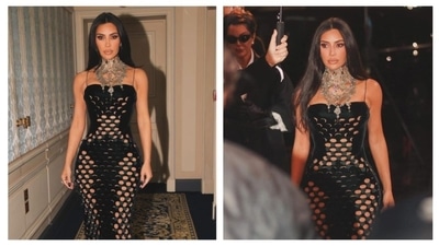 It's never a dull moment with Kim. As a trendsetter, she knows how to push boundaries. In a custom Maison Margiela leather dress with risqué hollow cutouts, she's a fierce fashionista who doesn't play by the rules. With a statement silver choker neckpiece and nude makeup, she knows she commands attention.. (Instagram/@kimkardashian)