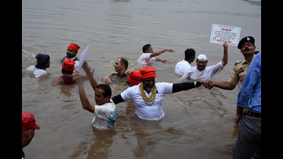Navi Mumbai, India - July 12, 2024:Navi Mumbai airport PAPs resort to `Jal SamadhiÕ protest, threaten work stoppage - Demand jobs, work, compensation at Ulwe in Navi Mumbai, India, on Friday, July 12, 2024. (Photo by Bachchan Kumar/ HT PHOTO) (HT PHOTO) Navi Mumbai, India - July 12, 2024:Navi Mumbai airport PAPs resort to `Jal SamadhiÕ protest, threaten work stoppage - Demand jobs, work, compensation at Ulwe in Navi Mumbai, India, on Friday, July 12, 2024. (Photo by Bachchan Kumar/ HT PHOTO) (HT PHOTO)