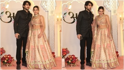 Sara Ali Khan and Ibrahim Ali Khan pose for the paps at the wedding venue. While Sara chose a blush pink silk lehenga set, Ibrahim looked dapper in a black bandhgala jacket, matching pants, and suede boots. (HT Photo/Varinder Chawla) Sara Ali Khan and Ibrahim Ali Khan pose for the paps at the wedding venue. While Sara chose a blush pink silk lehenga set, Ibrahim looked dapper in a black bandhgala jacket, matching pants, and suede boots. (HT Photo/Varinder Chawla)