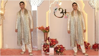 Vedang Raina was one of the best-dressed male celebs at Anant and Radhika's wedding. He stole the show in sequin embroidered beige sherwani, cream silk pants, and a shawl. Embellished mojaris and a buzz cut completed the look. (HT Photo/Varinder Chawla ) Vedang Raina was one of the best-dressed male celebs at Anant and Radhika's wedding. He stole the show in sequin embroidered beige sherwani, cream silk pants, and a shawl. Embellished mojaris and a buzz cut completed the look. (HT Photo/Varinder Chawla )
