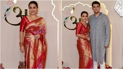 Vidya Balan attended Anant Ambani and Radhika Merchant's wedding in a red Kanjeevaram saree. Meanwhile, Siddharth Roy Kapur wore a sequinned kurta and white churidar pants. (HT Photo) Vidya Balan attended Anant Ambani and Radhika Merchant's wedding in a red Kanjeevaram saree. Meanwhile, Siddharth Roy Kapur wore a sequinned kurta and white churidar pants. (HT Photo)