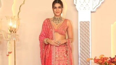 Kriti Sanon added a dose of colour in a bright pink lehenga. 