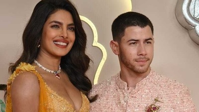 Make some noise for the Desi Girl! Priyanka Chopra arrived at the wedding with husband Nick Jonas and posed for photographs. Make some noise for the Desi Girl! Priyanka Chopra arrived at the wedding with husband Nick Jonas and posed for photographs.