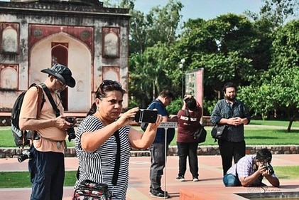 Photography enthusiasts take to their cameras in Sunder Nursery.