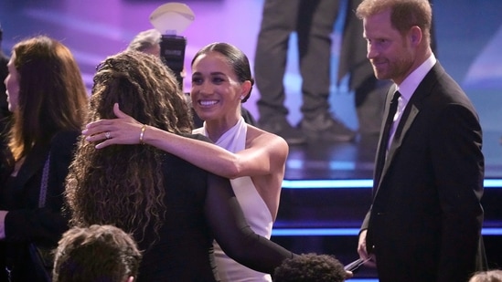 Meghan Markle, center and Prince Harry, right, arrive at the ESPY awards on Thursday, July 11, 2024, at the Dolby Theatre in Los Angeles. (AP Photo/Mark J. Terrill)(AP)