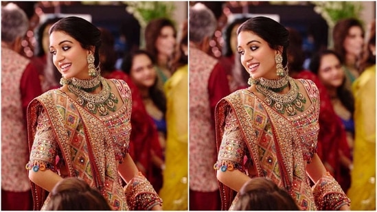 With the help of hair stylist Amit Thakur, Radhika styled her luscious tresses into a middle-parted braided hairdo adorned with golden embellishments, adding a touch of royal elegance to her look.(Instagram)