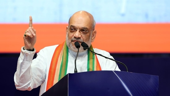 Gandhinagar, July 06 (ANI): Union Home Minister Amit Shah addresses during the 'Prosperity through Cooperation' programme on the 102nd International Cooperative Day, in Gandhinagar on Saturday. (ANI Photo) (Amit Shah X)