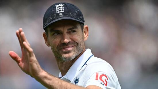 England's James Anderson waves to the crowd during a presentation ceremony after the conclusion of play on the third day of the first Test against West Indies at Lord's, in London on Friday. (AFP)