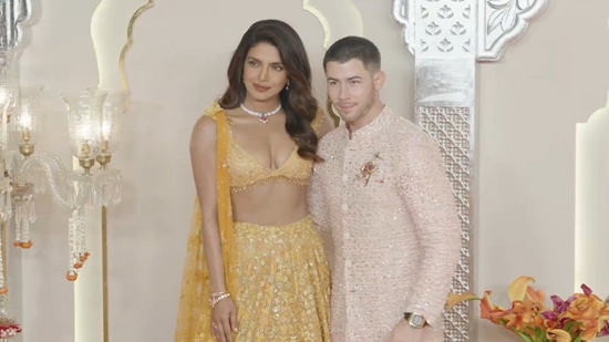 Priyanka Chopra and Nick Jonas arrive at Anant Ambani's wedding venue.