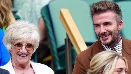 Former English footballer, David Beckham, was spotted suited up with his mother, Sandra West, on match day. (The Associated Press)