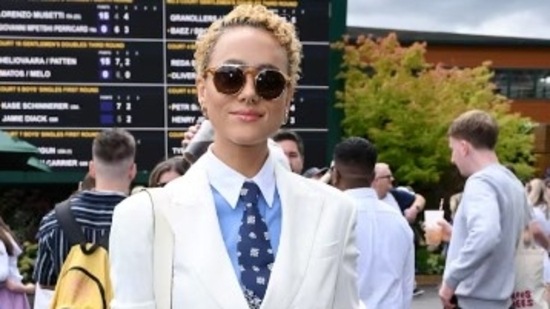 Fast & Furious actor Nathalie Emmanuel was seen suited up in a sleek white Ralph Lauren piece in the brand’s suite before the game.(The Associated Press)