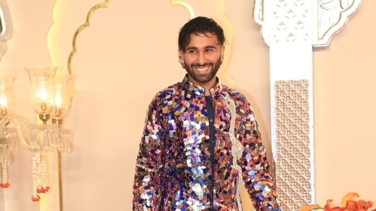 Orry is all smiles as he strikes a pose at the venue.