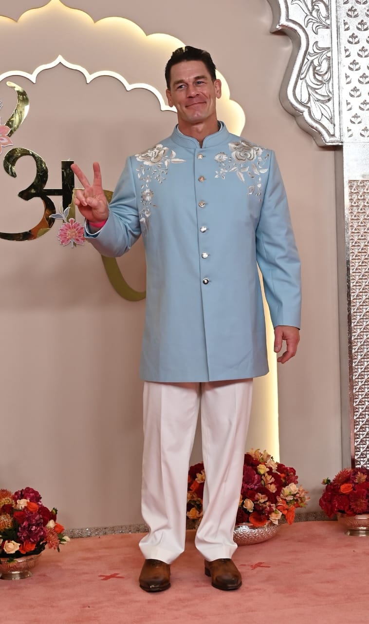 John Cena in his blue suit. John Cena in his blue suit.