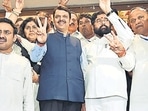 CM Eknath Shinde and Dy CM Devendra Fadnavis flash the victory sign with winning candidates of Mahayuti, after winning the MLC election during the monsoon session at Vidhan Bhavan in Mumbai on Friday, July 12, 2024. (Photo by Anshuman Poyrekar/ Hindustan Times) (Hindustan Times) CM Eknath Shinde and Dy CM Devendra Fadnavis flash the victory sign with winning candidates of Mahayuti, after winning the MLC election during the monsoon session at Vidhan Bhavan in Mumbai on Friday, July 12, 2024. (Photo by Anshuman Poyrekar/ Hindustan Times) (Hindustan Times)