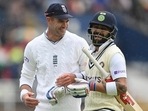 James Anderson (L) and Virat Kohli in 2021. 