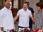 Congress president Mallikarjun Kharge with party leaders Rahul Gandhi and Priyanka Gandhi during a press conference, in New Delhi.